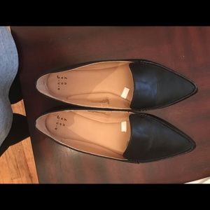 Black pointed loafers